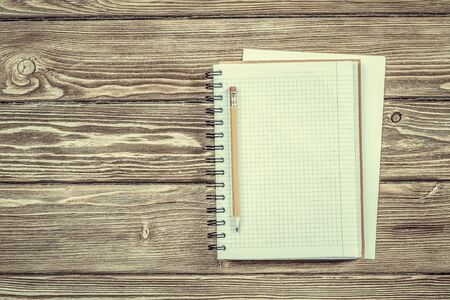 Notebook with pencil