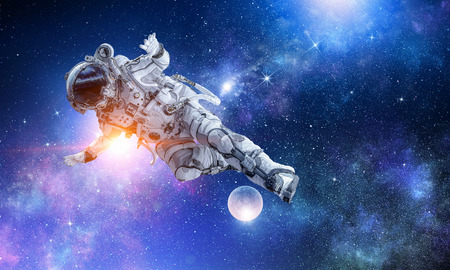 Astronaut play soccer gameの写真素材