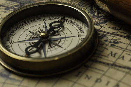 Retro compass with old mapの写真素材