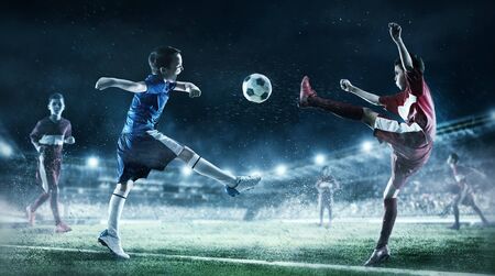 Children play soccer. Mixed mediaの写真素材