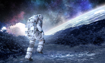 Spaceman running fast. Mixed mediaの写真素材