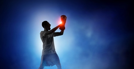 Soccer player at stadium. Mixed mediaの写真素材