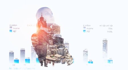 Thoughtful businesswoman with hand on chinの写真素材