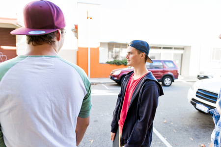 Teenage friends walking at the street