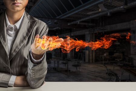 Fire burning in her hands. Mixed mediaの写真素材