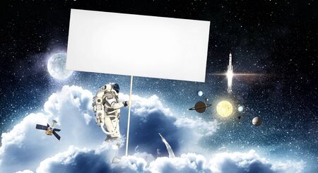 Spaceman with banner. Mixed media