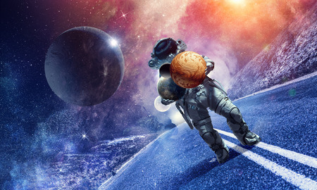 Astronaut holding in hands mars planet.の写真素材