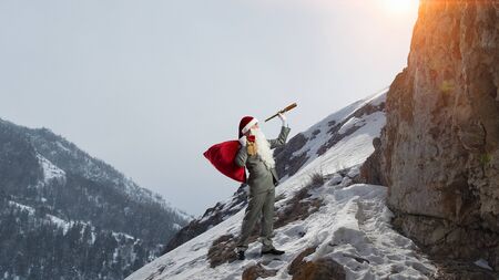 Santa looking for the way. Mixed mediaの写真素材