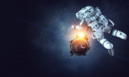 Astronaut floating in outer space.