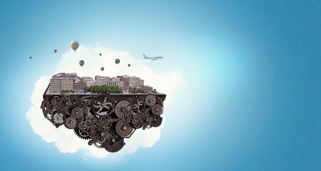 Cityscape island on gear mechanism floating in air. Mixed media