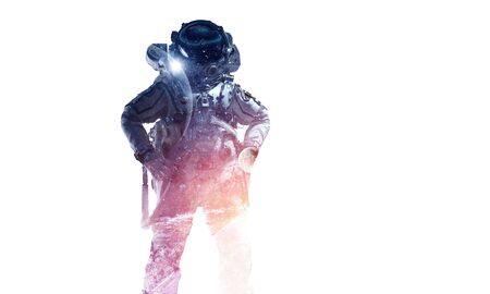 Double exposure of astronaut and space on white background. Mixed media