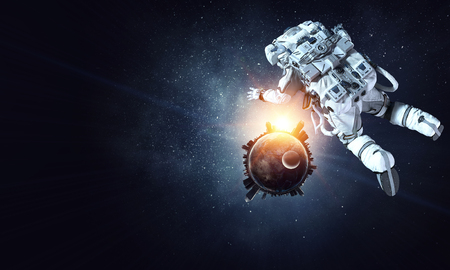 Astronaut floating in outer space.の写真素材