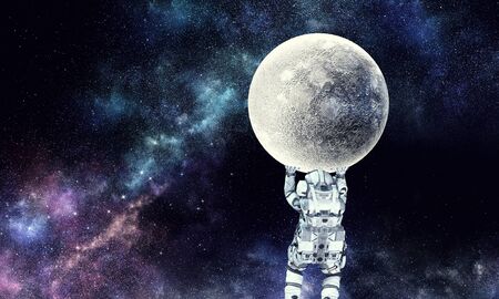 Astronaut lifting planet above head.