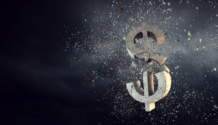 Cracked stone dollar sign on dark background. Mixed mediaの写真素材