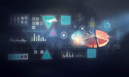 Media panel with infographs in dark office. Mixed mediaの写真素材