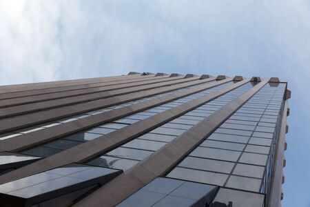 Low angle shot of modern glass city buildings