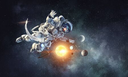 Astronaut floating in outer space.
