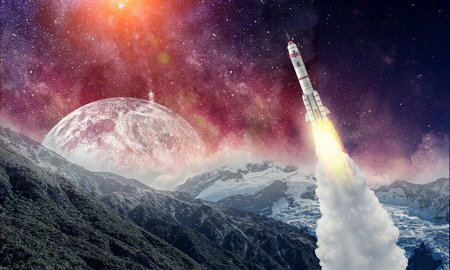 Rocket flying in starry space sky. Mixed media