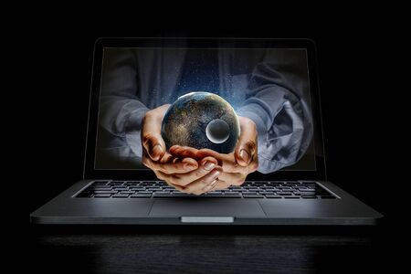 Businessman hands holding Earth planet.の写真素材