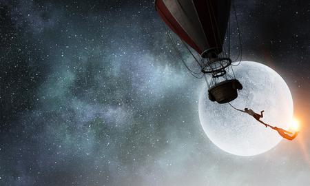 Woman traveling in aerostat . Mixed mediaの写真素材