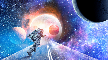 Space fantasy concept with running astronaut. Mixed mediaの写真素材