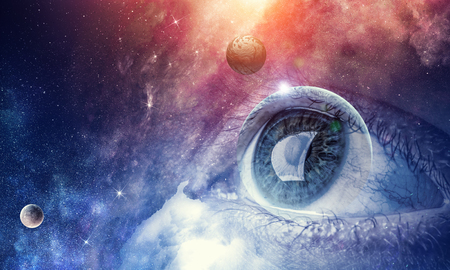 Human eye and space starry fantasy backgroundの写真素材