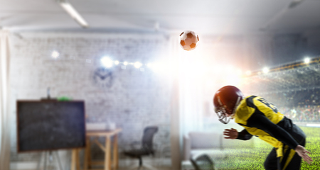 Center player running with ball in hands. Mixed mediaの写真素材