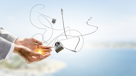 Internet connection plug and human hands. Mixed media