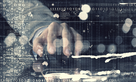 hand of businessman on table using mouse. Mixed mediaの写真素材