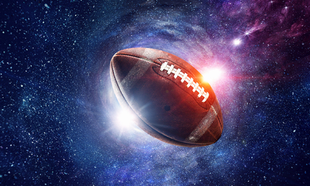 Rugby ball against abstract space purple backgroundの写真素材