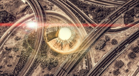 Bird eye view of modern city with human female eye