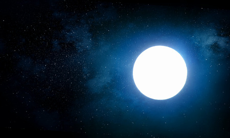 Full moon glowing in dark night sky .
