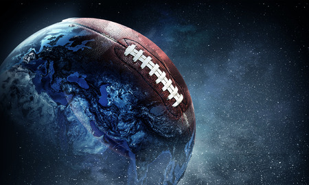 Rugby ball against abstract space purple background.の写真素材