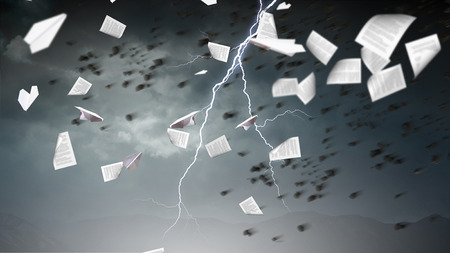 Color aerostat floating in dark sky as crisis concept. Mixed mediaの写真素材