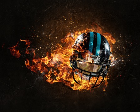 Burning rugby helmetの写真素材