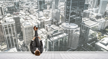 Woman relax on floor with smartphone in handの写真素材