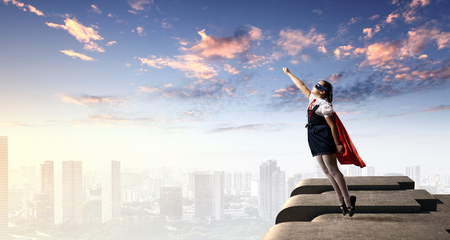 Little kid protecting the city from evilの写真素材