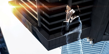 Businesswoman talking mobile phoneの写真素材