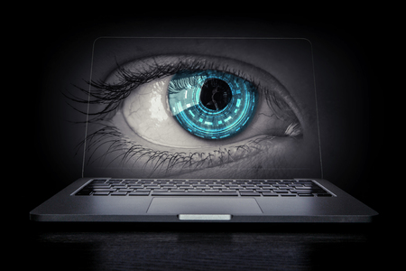 Female eye from laptopの写真素材