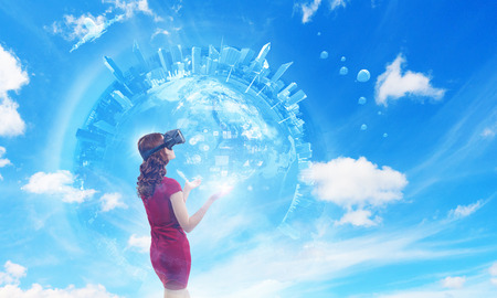 Experiencing virtual technology world. Mixed mediaの写真素材