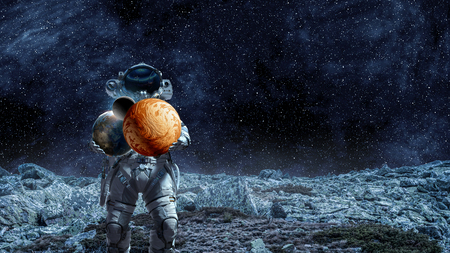 Spaceman carry big planet. Mixed mediaの写真素材