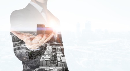 Businessman with opened palmの写真素材