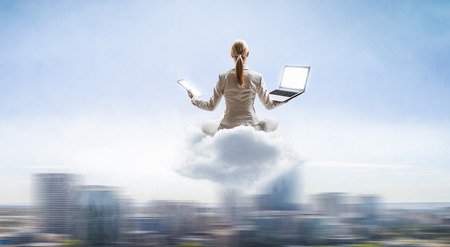 Woman float above city