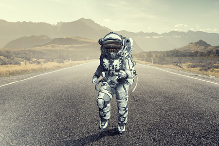 Spaceman running fast. Mixed mediaの写真素材