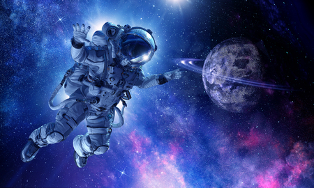 Astronaut on space mission. Mixed mediaの写真素材