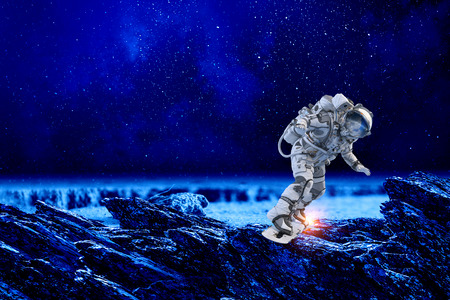 Spaceman on flying board. Mixed mediaの写真素材