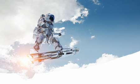 Spaceman on flying board. Mixed mediaの写真素材