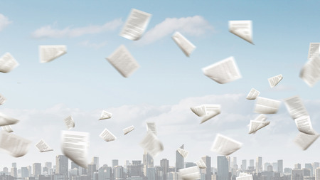 Business papers in airの写真素材