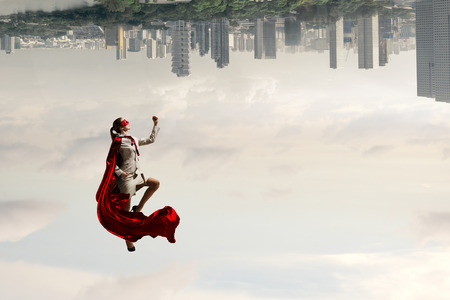 Super woman in skyの写真素材