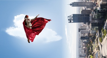 Super woman in skyの写真素材
